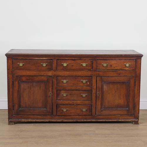 A LATE 18TH CENTURY STAINED PINE KITCHEN DRESSER
