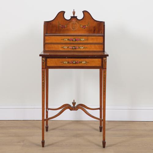 AN EDWARDIAN POLYCHROME DECORATED SATINWOOD WORK TABLE