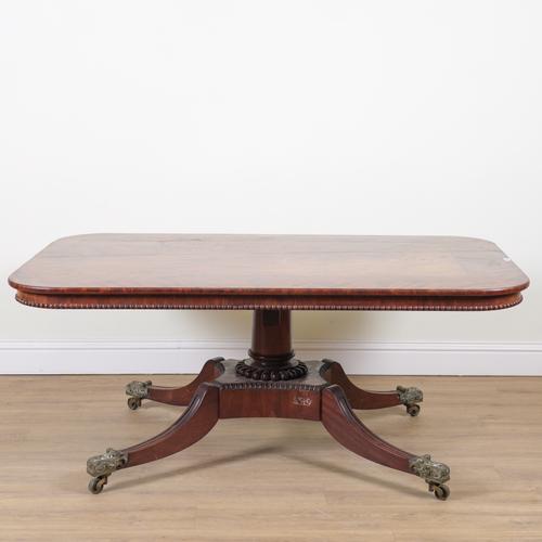 A REGENCY MAHOGANY CROSSBANDED RECTANGULAR SNAP TOP CENTRE TABLE