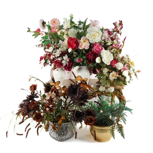 A GROUP OF FAUX FLOWER ARRANGEMENTS (8)