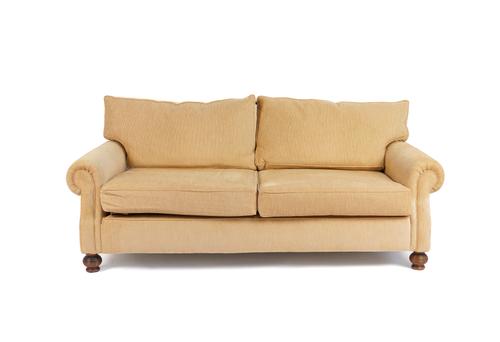 A SAND UPHOLSTERED TWO SEAT SOFA