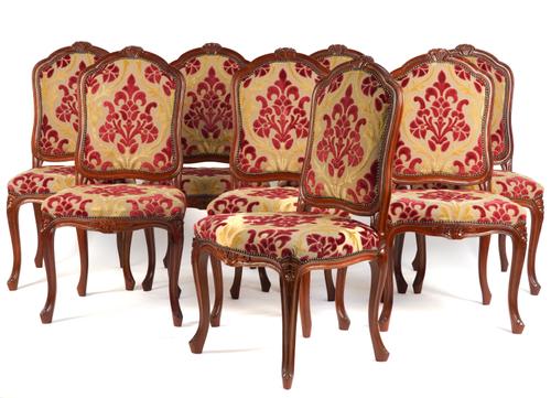 A SET OF EIGHT CARVED HARDWOOD FRAMED LOUIS XV STYLE DINING CHAIRS (8)