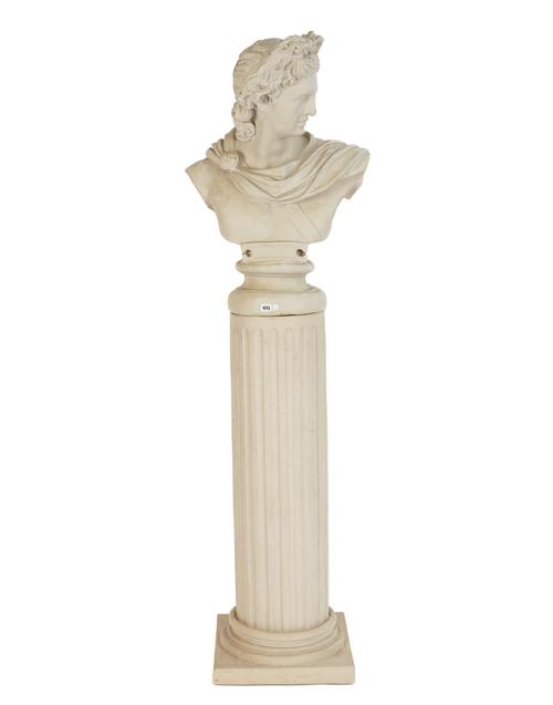 A FAUX MARBLE FIGURAL BUST OF A ROMAN EMPEROR ON FLUTED COLUMN