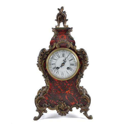 A FRENCH GILT-METAL MOUNTED AND BRASS INLAID TORTOISESHELL ‘BOULLE’’ MANTEL CLOCK