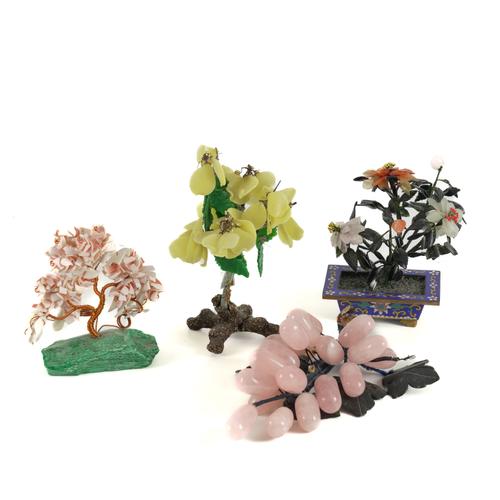 A GROUP OF CHINESE HARDSTONE ORNAMENTAL ARRANGEMENTS OF FLOWER AND TREES, INCLUDING A CLOISONNÉ URN WITH CHRYSANTHEMUMS (4)