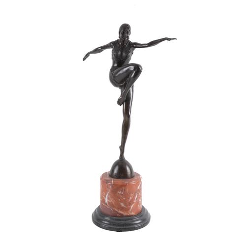 IN THE MANNER OF DEMETRE CHIPARUS: A PATINATED BRONZE OF A DANCER