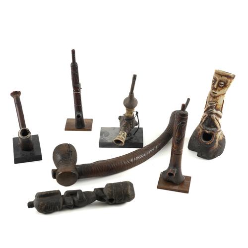 TRIBAL INTEREST: A GROUP OF PIPES INCLUDING A DEMOCRATIC REPUBLIC OF CONGA KUBA PIPE (7)