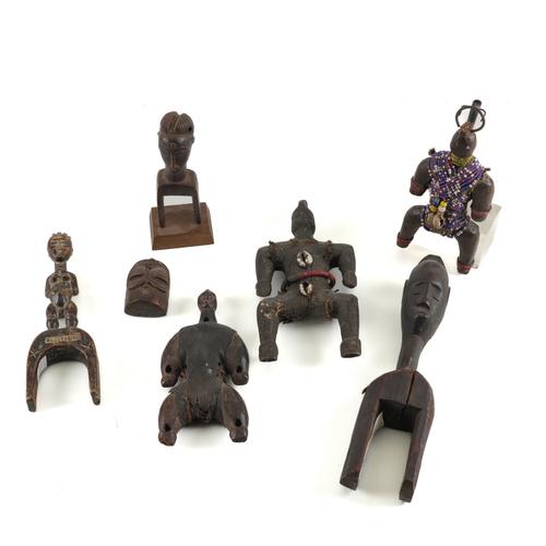 TRIBAL INTEREST: THREE IVORY COAST HEDDLE PULLEYS, NAMJI DOLLS AND AN AMULET (10)