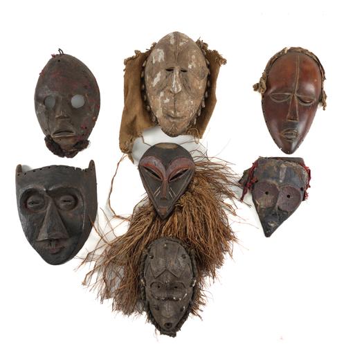 TRIBAL INTEREST: A GROUP OF WOOD MASKS INCLUDING A PENDE AND KUBA EXAMPLES  (7)