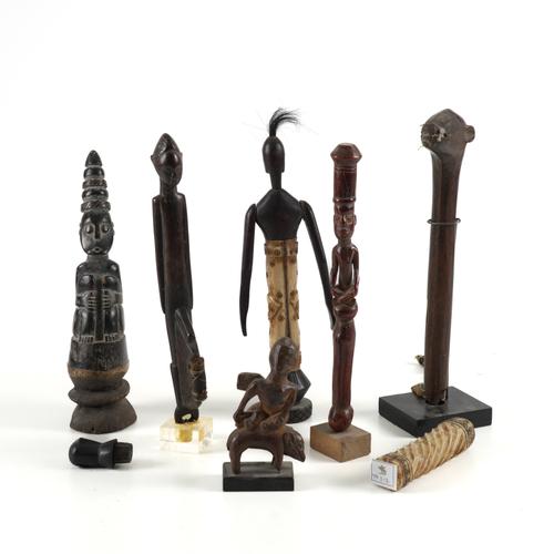 TRIBAL INTEREST: A GROUP OF CARVED HARDWOOD FIGURES AND MALLETS INCLUDING A YORUBA EXAMPLES  (7)