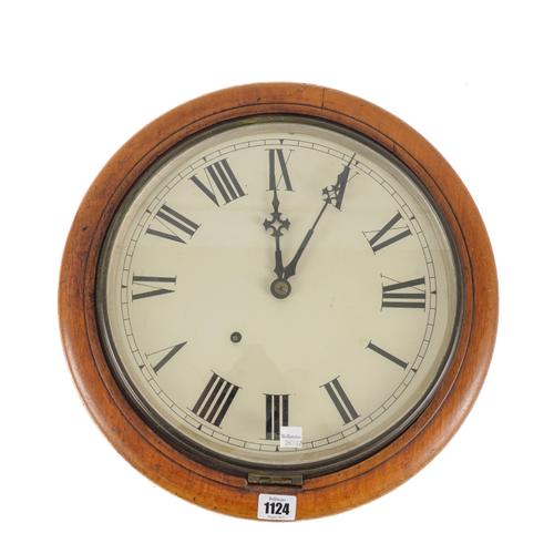 A BEECH WOOD MOULDED CIRCULAR TIME PIECE
