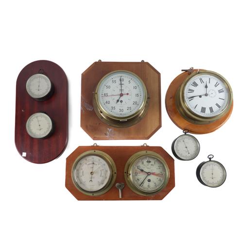 NEGRETTI & ZAMBRA: FOUR COMPENSATED BAROMETERS IN LEATHER CASES; WITH BULK HEAD CLOCKS (8)