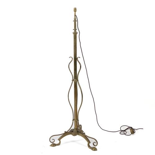AN ART NOUVEAU BRASS HEIGHT ADJUSTABLE FLOOR STANDING LIGHT