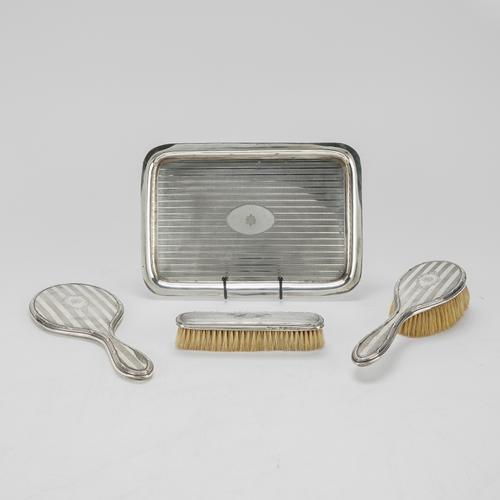 A GROUP OF SILVER AND SILVER MOUNTED DRESSING TABLE WARES (4)