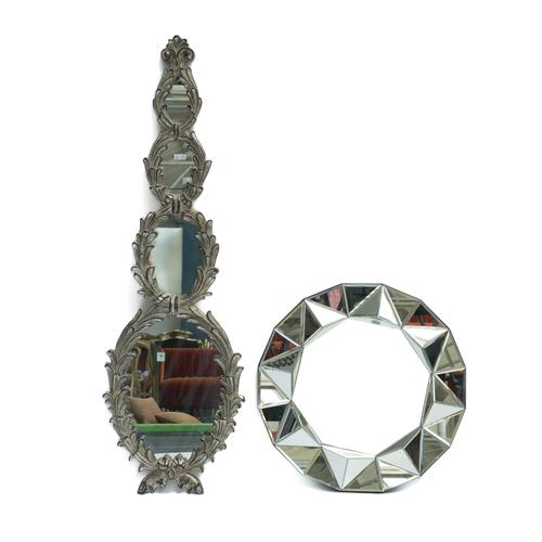 A MODERN CIRCULAR WALL MIRROR (2)