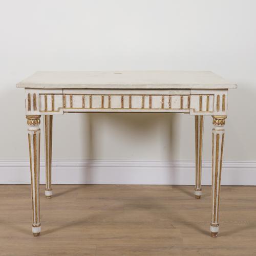 A 19TH CENTURY LATER WHITE PAINTED PARCEL GILT RECTANGULAR OCCASIONAL TABLE