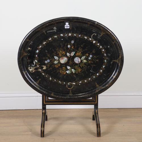 A 19TH CENTURY MOTHER OF PEARL INLAID POLYCHROME PAINTED PAPIER MACHE OVAL TRAY (2)