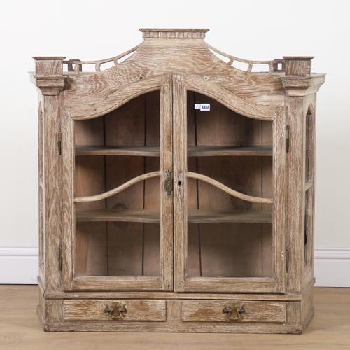 AN 18TH CENTURY DUTCH LATER BLEACHED OAK HANGING TWO DOOR DISPLAY CABINET
