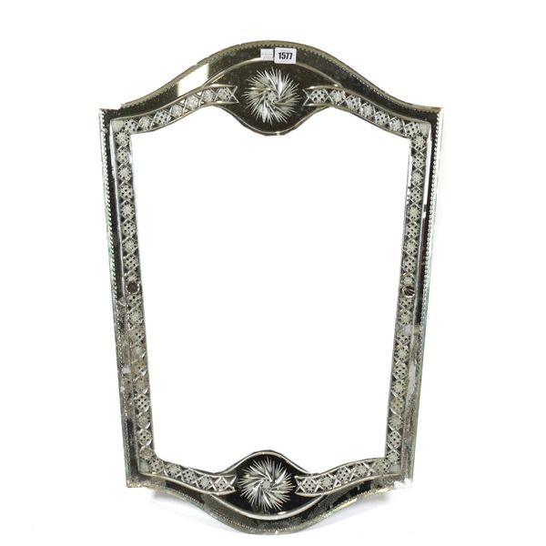 A LATE 19TH CENTURY CUT GLASS SHIELD SHAPED WALL MIRROR