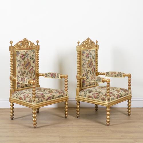 A PAIR OF LATE 19TH CENTURY GILT FRAMED OPEN ARMCHAIRS (2)