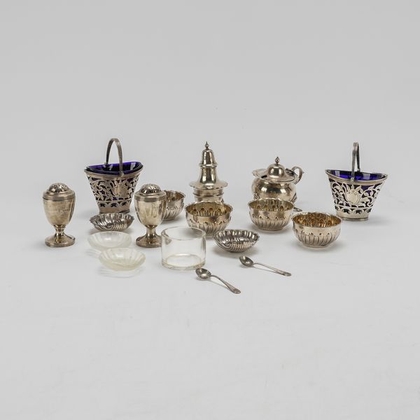 A GROUP OF SILVER CONDIMENTS (19)