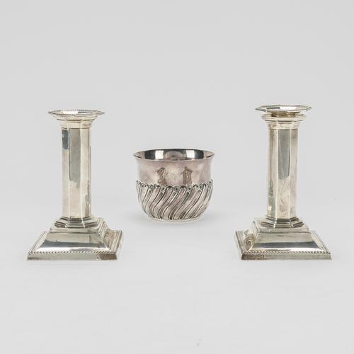 A VICTORIAN SILVER BOWL AND A NEAR PAIR OF SILVER CANDLESTICKS (2)