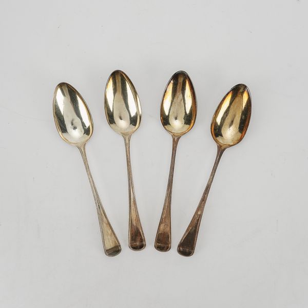 FOUR SILVER BEAD EDGED OLD ENGLISH PATTERN SILVER TABLESPOONS (4)