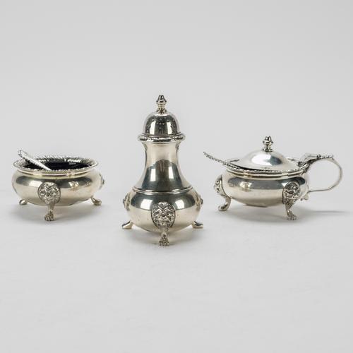 A SILVER COMPOSITE THREE PIECE CONDIMENT SET (5)