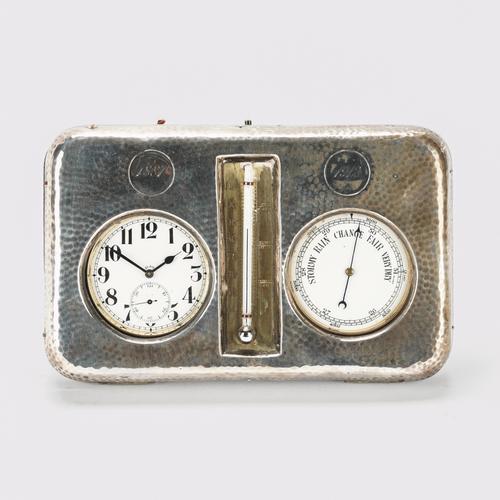 A SILVER MOUNTED FRAME/STAND TO HOLD A WATCH, A BAROMETER AND A THERMOMETER