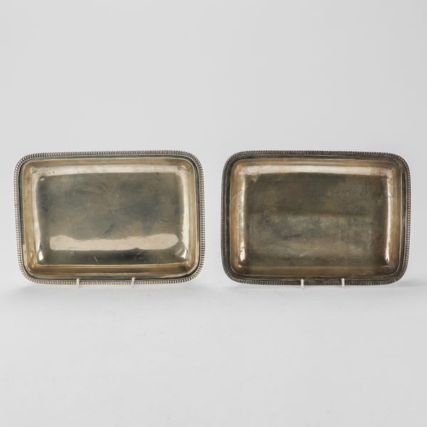 TWO GEORGE III SILVER RECTANGULAR ENTREE DISH BASES (2)