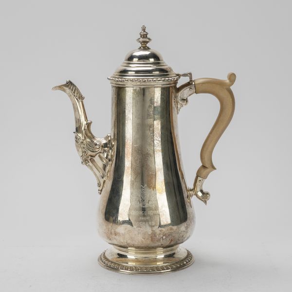 A SILVER COFFEE POT