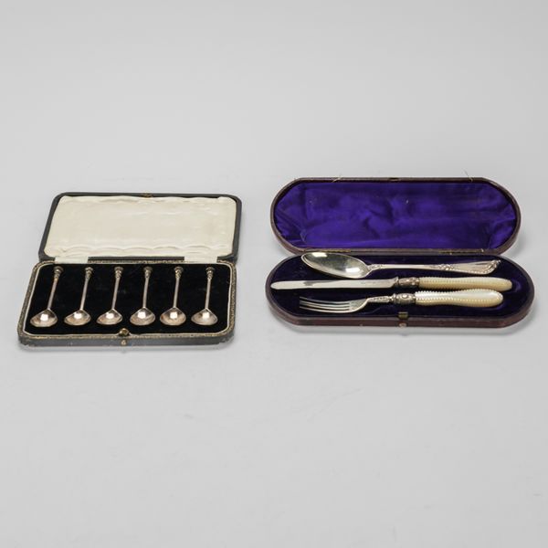TWO CASED SETS OF FLATWARE (2)