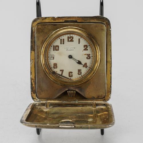 A STERLING SILVER MOUNTED RECTANGULAR CASED TRAVELLING CLOCK