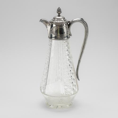 A VICTORIAN SILVER MOUNTED GLASS CLARET JUG