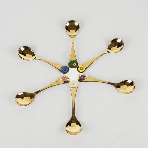 THIRTY-FOUR GEORG JENSEN SILVER GILT AND ENAMELLED COLLECTOR'S YEAR TYPE SPOONS (34)