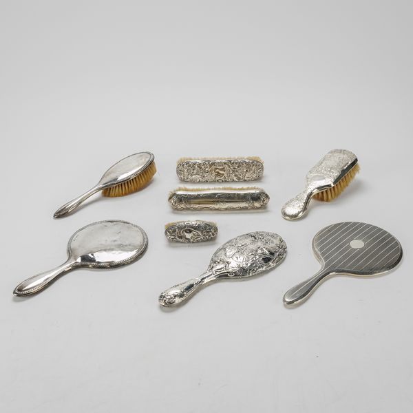 A GROUP OF SILVER MOUNTED DRESSING TABLE WARES (8)