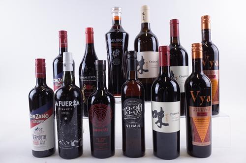 ELEVEN BOTTLES RED AND ONE WHITE VERMOUTH AND FLAVOURED WINE