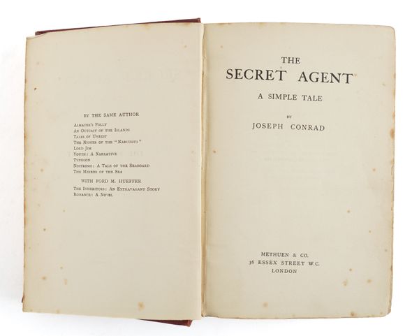 CONRAD, Joseph (1857-1924). The Secret Agent, London, 1907, 8vo, half title, 40-pages of publisher's advertisements at the end dated September 1907 (some spotting and staining), original red cloth gilt (extremities rubbed). FIRST EDITION, FIRST ISSUE.