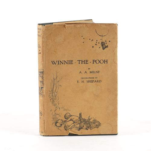 MILNE, A. A. (1882-1956). Winnie-the-Pooh ... Fifth Edition, 1927, 8vo, half title, illustrations by E. H. Shepard, some full-page, original green pictorial cloth gilt, dust-jacket (some light staining to the jacket, a few short tears without loss).