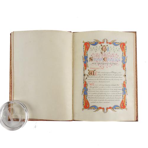 MANUSCRIPT TESTIMONIAL ON VELLUM - "An Address to the Venerable Stephen Creyke M.A. from the Clergy of the Archdeaconry of York." [York: c.1866]. Folio. A manuscript illuminated testimonial on 8 vellum leaves, original red morocco gilt (rubbed).
