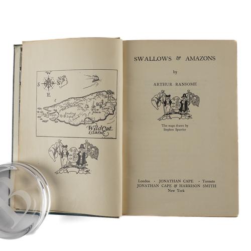 RANSOME, Arthur (1884-1967). Swallows & Amazons, London, 1930, 8vo, original blue cloth gilt (some fading, without the dust-jacket). FIRST EDITION. RARE.
