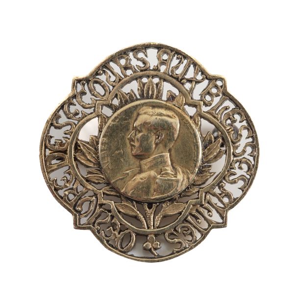 A BELGIAN GILT FIRST WORLD WAR PERIOD BADGE