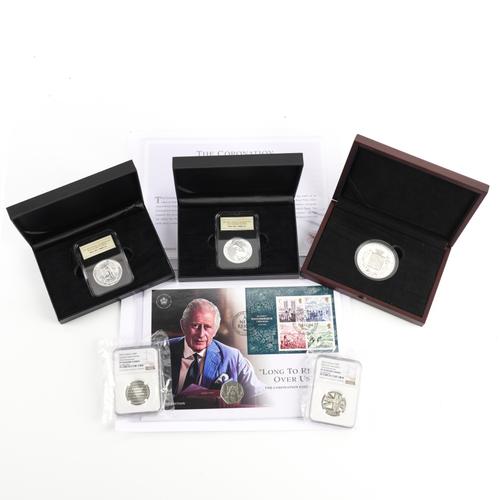 A GROUP OF COMMEMORATIVE FIFTY PENCES AND TWO SILVER ONE OUNCE BRITANNIAS (6)