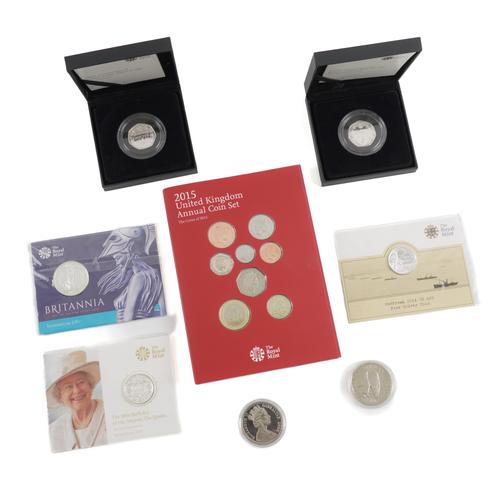 A GROUP OF MOSTLY BRITISH ROYAL MINT COLLECTOR'S COINS (8)