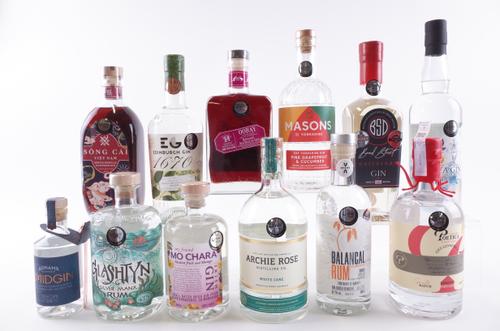 NINE BOTTLES GIN AND THREE RUM