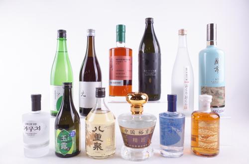 TWELVE BOTTLES VARIOUS ASIAN SPIRITS