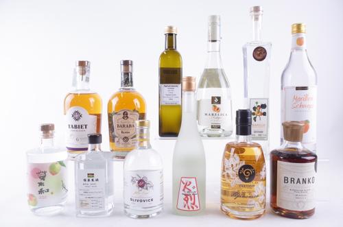 TWELVE BOTTLES VARIOUS SPIRITS AND LIQUEURS