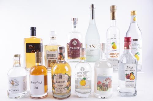 TWELVE BOTTLES PEAR AND QUINCE LIQUEURS AND SPIRITS