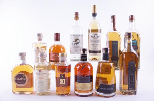 TWELVE BOTTLES GRAPPA AND PISCO