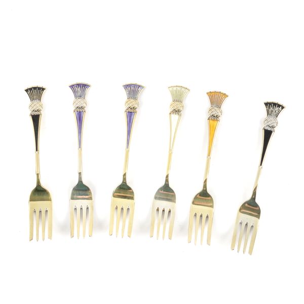 A SET OF SIX SILVER GILT AND VARI-COLOURED ENAMELLED SCANDINAVIAN PASTRY FORKS (6)